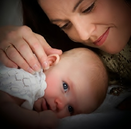 woman and baby cuddling